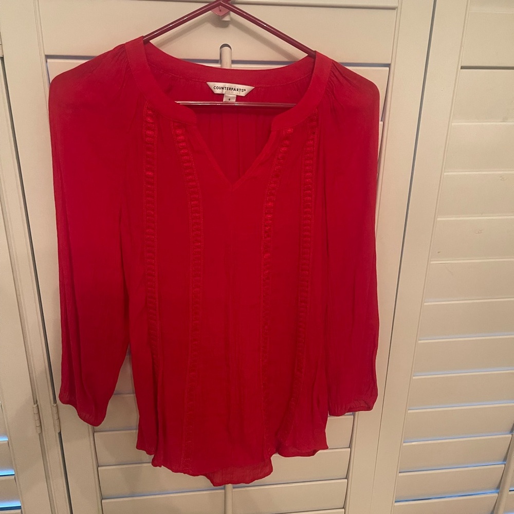 Beautiful red top nice for any occasion.